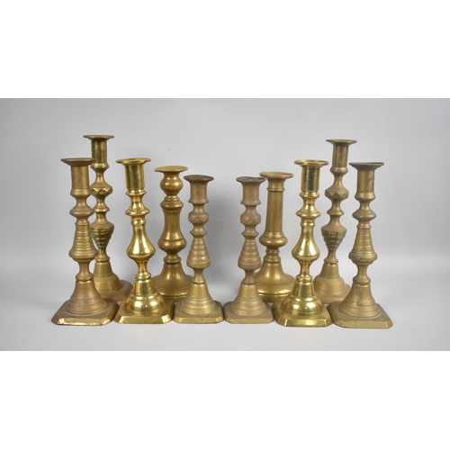 201 - A Collection of Five Pairs of 19th Century and Later Brass Candlesticks