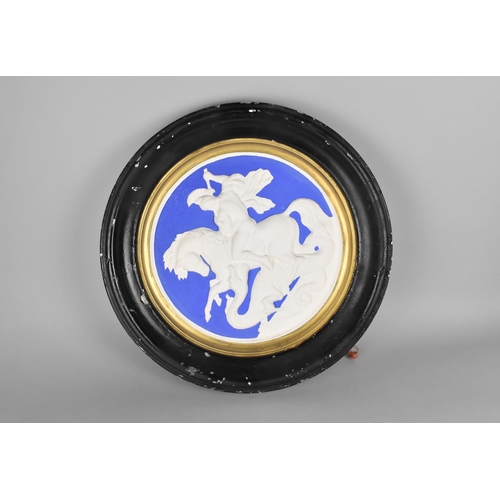 229 - A Circular Moulded Plaster Plaque Depicting George and The Dragon, 49cms Diameter