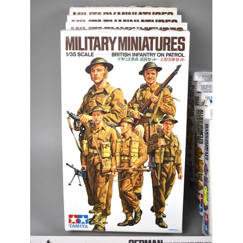 238 - A Box Containing Fifteen Tamiya Sets of Model Soldiers and Military Accessories, all model sets comp... 