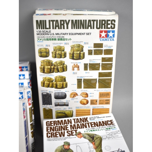 238 - A Box Containing Fifteen Tamiya Sets of Model Soldiers and Military Accessories, all model sets comp... 