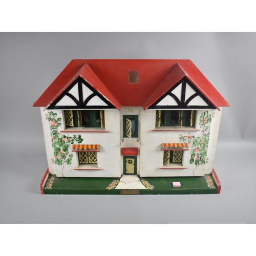 246 - A Vintage Wooden Dolls House with Later Furniture, 61cms Wide