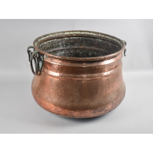 265 - A Large Cauldron Shaped Copper Coal Bucket with Two Iron Carry Handles, 42cm Diameter