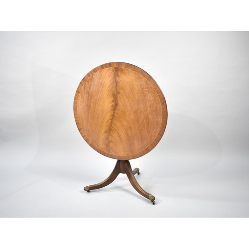 273 - A Reproduction Mahogany Snap Top Tripod Table with Cross Banded Top, 64cm diameter