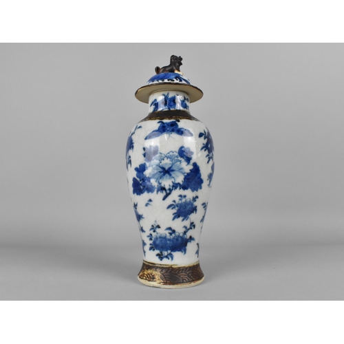 287 - A Chinese Blue and White Nanking Crackle Glazed Baluster Vase and Cover Decorated with Blossoming Br... 