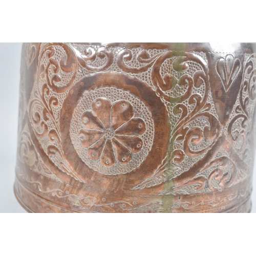 376 - A Kurdish/Turkish Copper Bucket with Repousse Work Decoration and Loop Carry Handle, 26cm diameter a... 