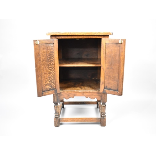 377 - A Mid 20th Century Oak Side Cabinet with Carved Panelled Doors to Shelved Interior, 47cm wide x 41cm... 