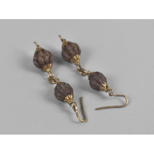 450 - A Pair of Antique Gilt Metal Mounted Earrings Each Mounted with Two Graduated Seeds/Nuts, Total Drop... 