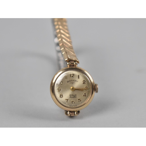 451 - A 9ct Gold Ladies Rotary Wrist Watch, Champagne Dial with Gilt Arabic Numerals, 24 Jewel Incabloc Mo... 