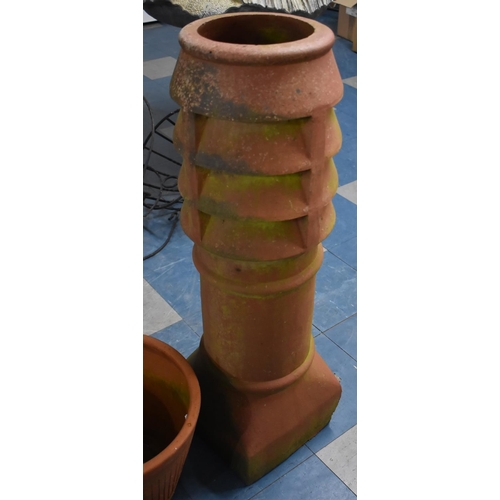 471 - A Large Terracotta Chimney Pot, 98cm high