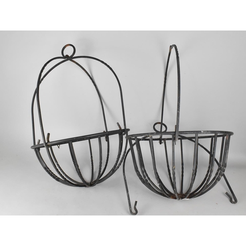 472 - A Pair of Wrought Metal Hanging Basket Plant Stands, 63cm high