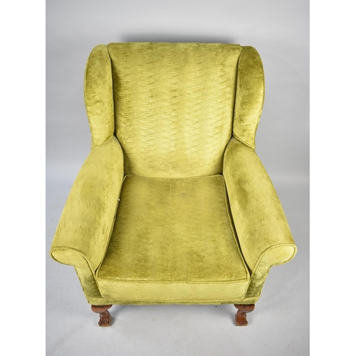 541 - A Mid 20th Century Upholstered Wing Armchair