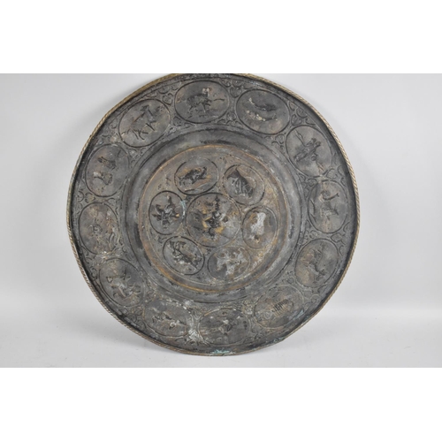 73 - An Early 20th Century Indian Brass Zodiac Charger/Tray Decorated with Figures and Animals, Fish and ... 