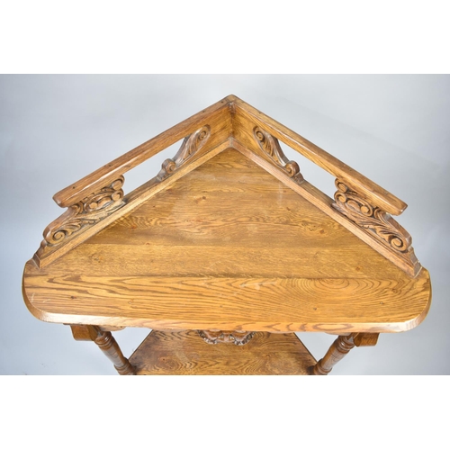 79 - A Late 20th Century Stained Oak Two Tier Corner Table with Pierced Galleried Top and Turned Supports... 