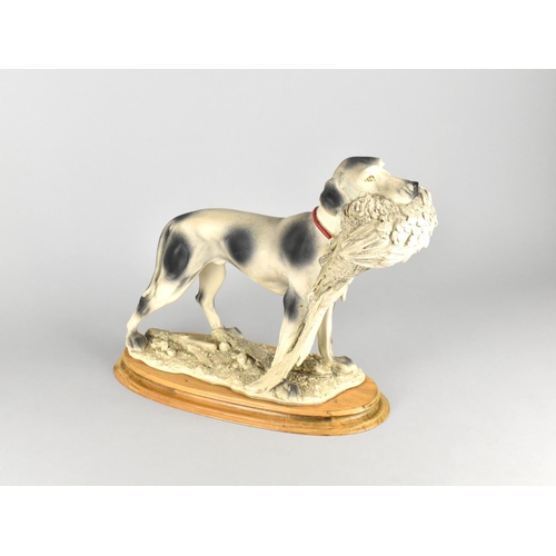 182 - A Large Resin Study of Sporting Dog Carrying Cock Pheasant on Oval Plinth Base, 38cms Wide