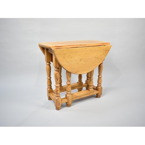 243 - A Modern Small Pine Drop Leaf Gate Leg Table, 54cms Long