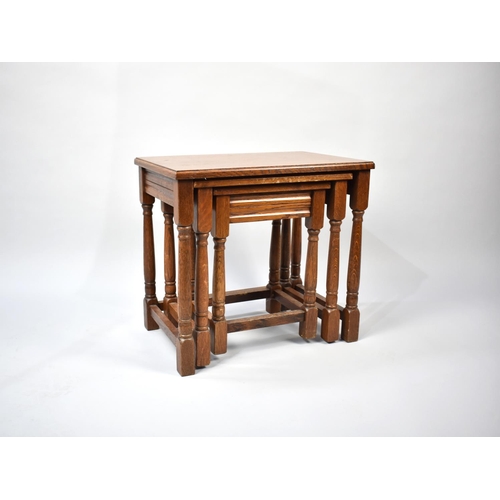 246 - A Mid/Late 20th Century Oak Nest of Three Tables, 51cms Wide