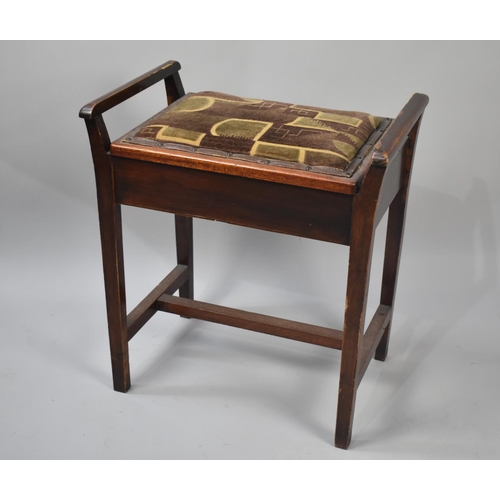 248 - An Edwardian Mahogany Framed Piano Stool with Lift Up Upholstered Pad Feet, 50cms Wide