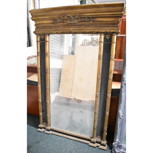 264 - A Large Reproduction Gilt and Ebonized Framed Pier Mirror, 97cms Wide and 156cms High