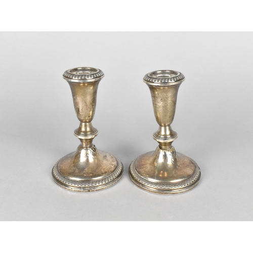 407 - A Pair of Sterling Silver Candlesticks, Weighted Bases, 13cm high (Some Condition Issues)