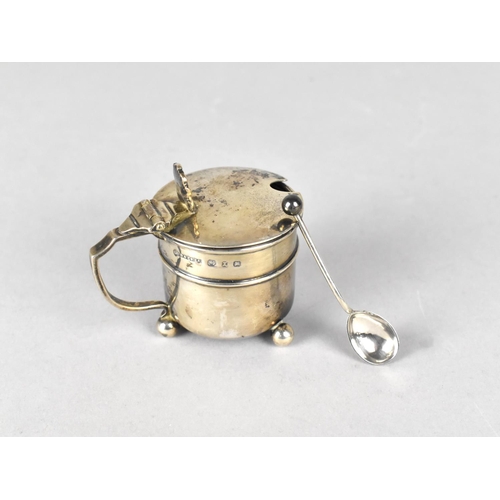 412 - A Silver Mustard Pot by Johnson, Durban & Co Ltd, with Shell Finial, Scrolled Handle and Raised on T... 