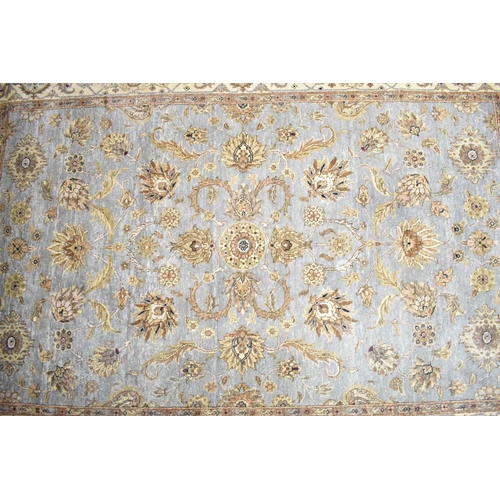 549 - A Large Patterned Rug, 277x182cm