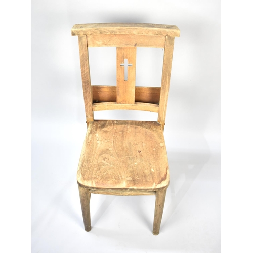 567 - A Chapel Chair with Prayer Book Trough and Crucifix Piercing to Back Rest