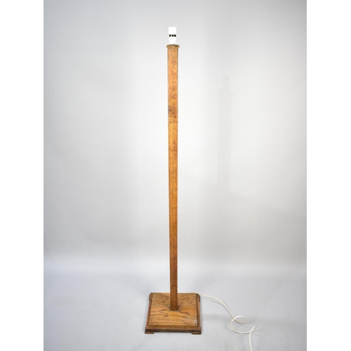 577 - An Art Deco Oak Standard Lamp