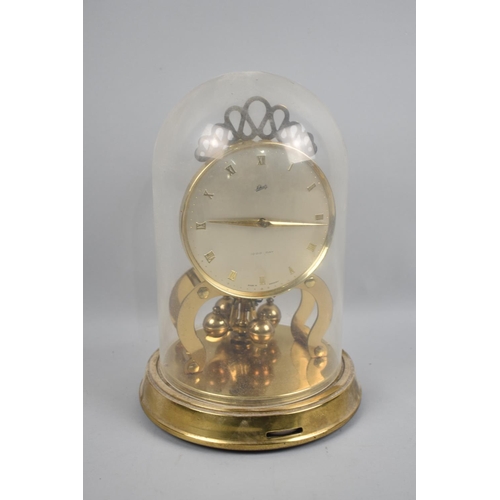 67 - A Mid 20th Century Pedestal Brass Mantel Clock by Schatz and Sons, Under Plastic Dome, 22.5cms High