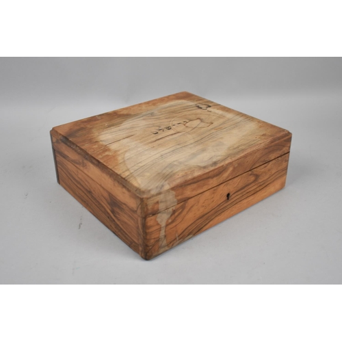 77 - An Olive Wood Box Containing Curios to include Fly Fishing Reel, Gilt Decorated Box, Ebonized Crucif... 