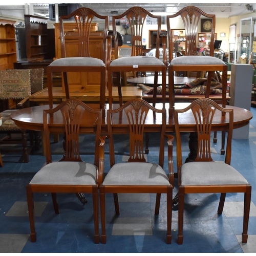 563 - A Mahogany Twin Pedestal Extending Dining Table with One Extra Leaf Together with a Set of Six Wheat... 