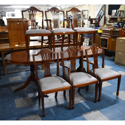 563 - A Mahogany Twin Pedestal Extending Dining Table with One Extra Leaf Together with a Set of Six Wheat... 