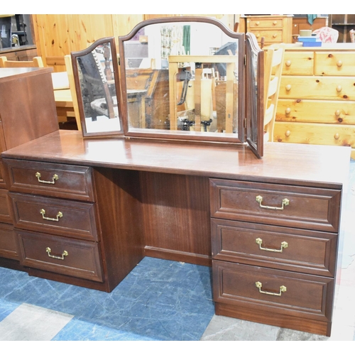 516 - A G Plan Mahogany Kneehole Dressing Table with Triple Mirror and Stool, 154cm wide