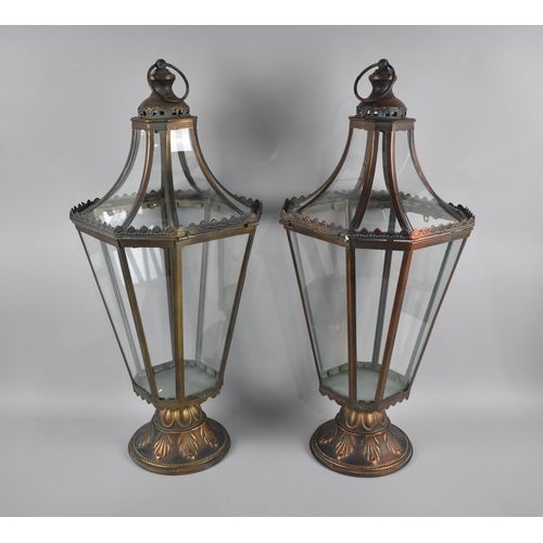 116 - A Pair of Patinated Bronze Effect Lanterns of Tapering Octagonal Form, 70cms High