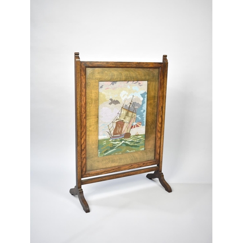 118 - A Mid 20th Century Oak Framed Tapestry Fire Screen depicting Sailing Galleon, 59cms Wide