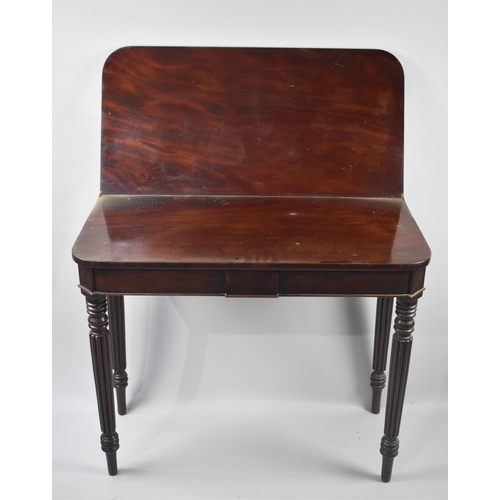 130 - A 19th Century Mahogany Lift and Twist Tea Table with Turned Reeded Support, 91cms Wide