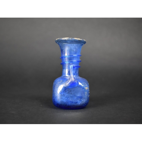 18 - An Early Continental Iridescent Blue Glass Vase with Flared Neck and Cubed Belly Base, Hand Blown, 9... 