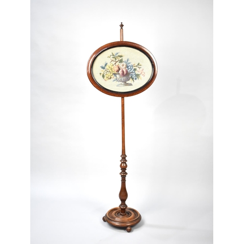 186 - A Late Victorian Mahogany Pole Screen with Oval Rise and Fall Tapestry Panel, Circular Base and Ball... 