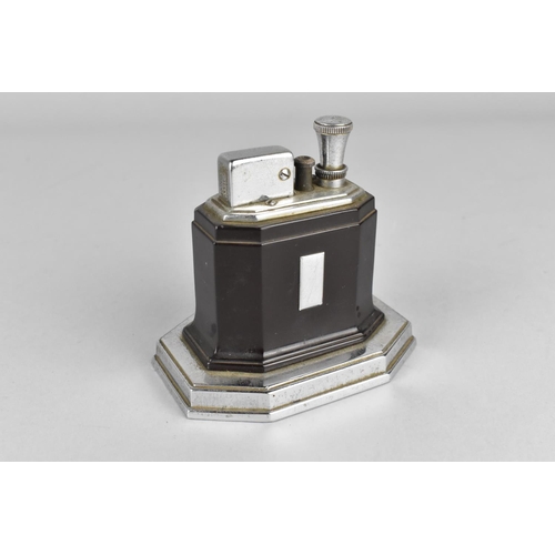 19 - An Art Deco Ronson Touch Tip Table Lighter in Chrome and Bakelite