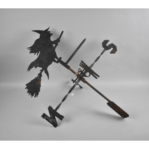 202 - A Fret Cut Metal Weathervane in the Form of Witch riding Broomstick, 77cms High