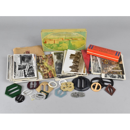 212 - A Collection of Curios to include Postcards, Belt Buckles, Mouth Organ, Vintage Tin