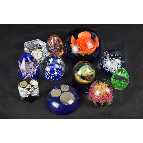 213 - A Collection of Various Glass Paperweights