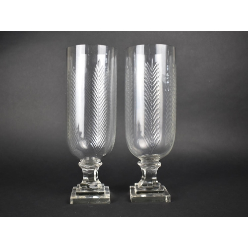 228 - A Pair of Tall Glass Hurricane Lamps, 34cms High