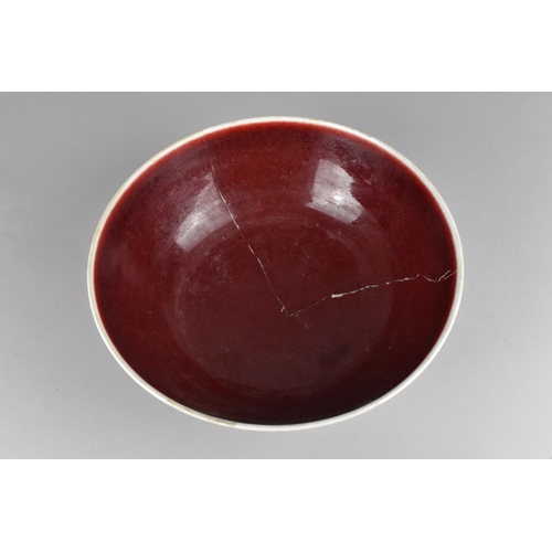 275 - A Chinese Porcelain Sang-De-Boeuf Glazed 'Peach' Bowl the Sides with Underglazed Blanc De Chine Deta... 