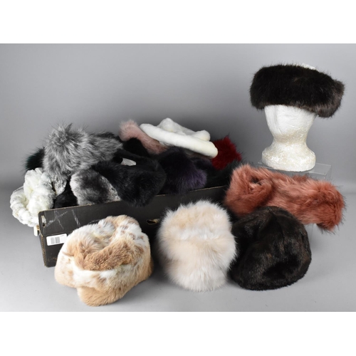 360 - A Large Collection of Various Faux Fur Hats and Ear Warmers