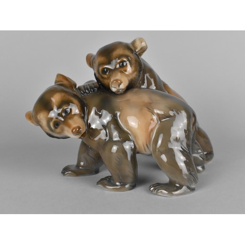 395 - A Rosenthal Porcelain Bear Cub Group, 15cm high