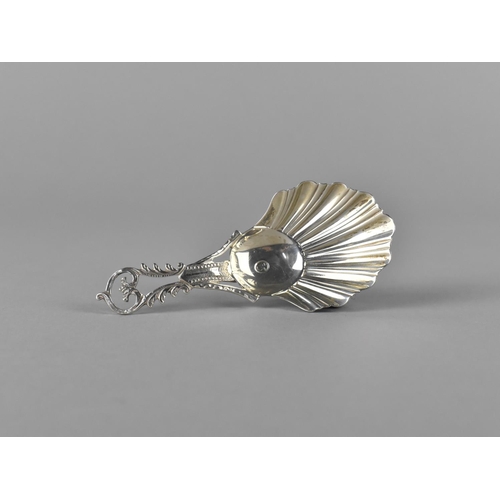 398 - A Silver Caddy Spoon with Scrolled and Pierced Handle and Shell Bowl, Sheffield Hallmark, 9cm long