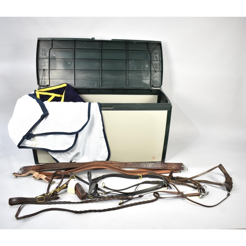 435 - A Modern Plastic Horse Blanket Box Containing Various Leather Head Collars, Girths, Blankets Etc