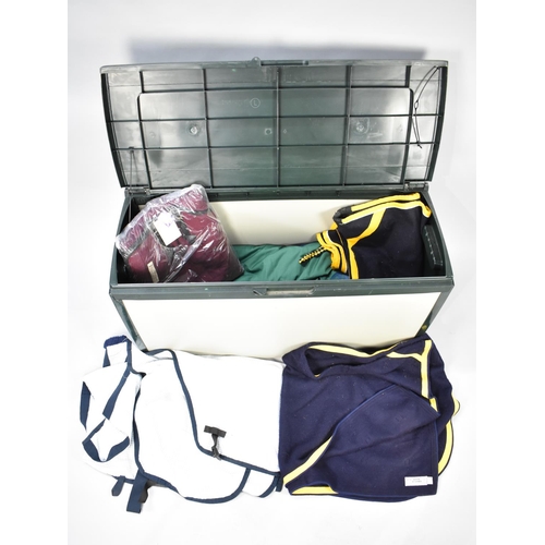 435 - A Modern Plastic Horse Blanket Box Containing Various Leather Head Collars, Girths, Blankets Etc