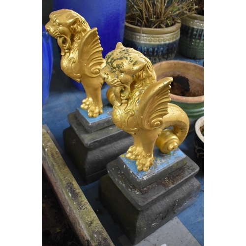 451 - A Large Pair of Painted Reconstituted Studies of Winged Griffin on Tapering Plinth Bases, 84cm high