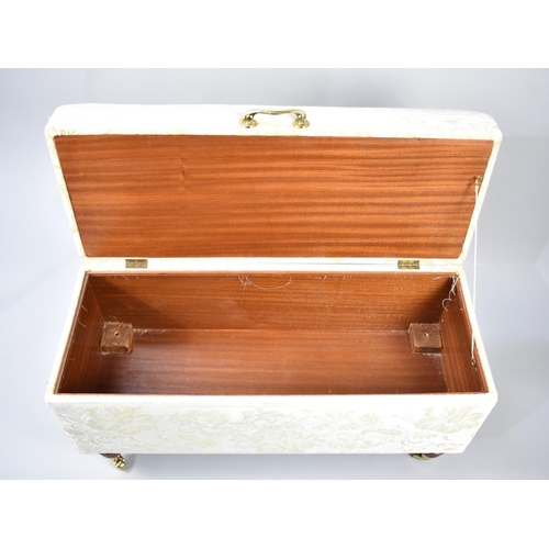 473 - A Modern Upholstered Blanket Box with Hinged Lid, Turned Wooden Feet with Brass Castors, 92cms Wide